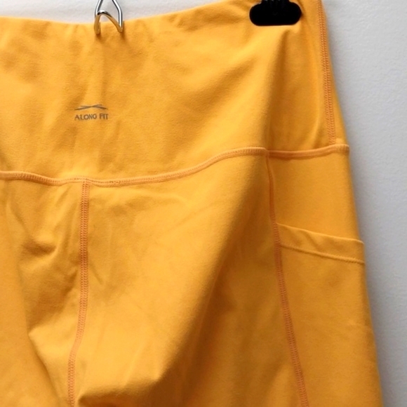 Along Fit High Waisted with Pocket both side Leggings sz Large in Golden yellow - Picture 7 of 9